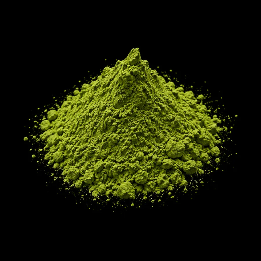 JAS organic culinary grade matcha powder mounded on black, the most yellow-green in the range